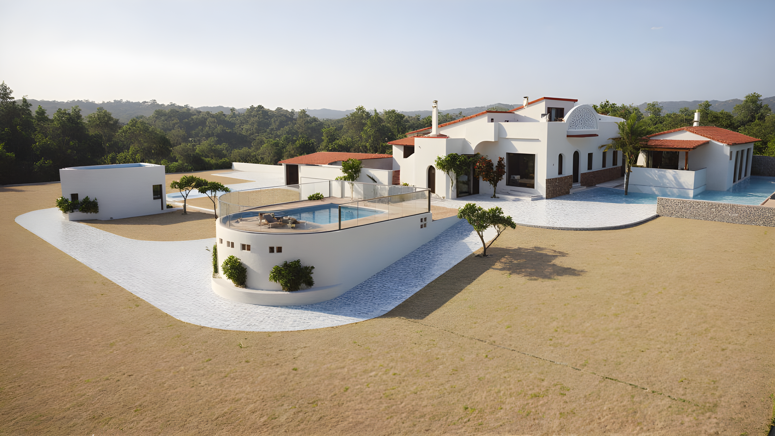 vue aérienne d'une grande maison blanche avec plusieurs toits rouges et une piscine extérieure entourée d'une terrasse en béton, dans un jardin avec quelques arbres et une étendue de terrain sec, avec une forêt en arrière-plan