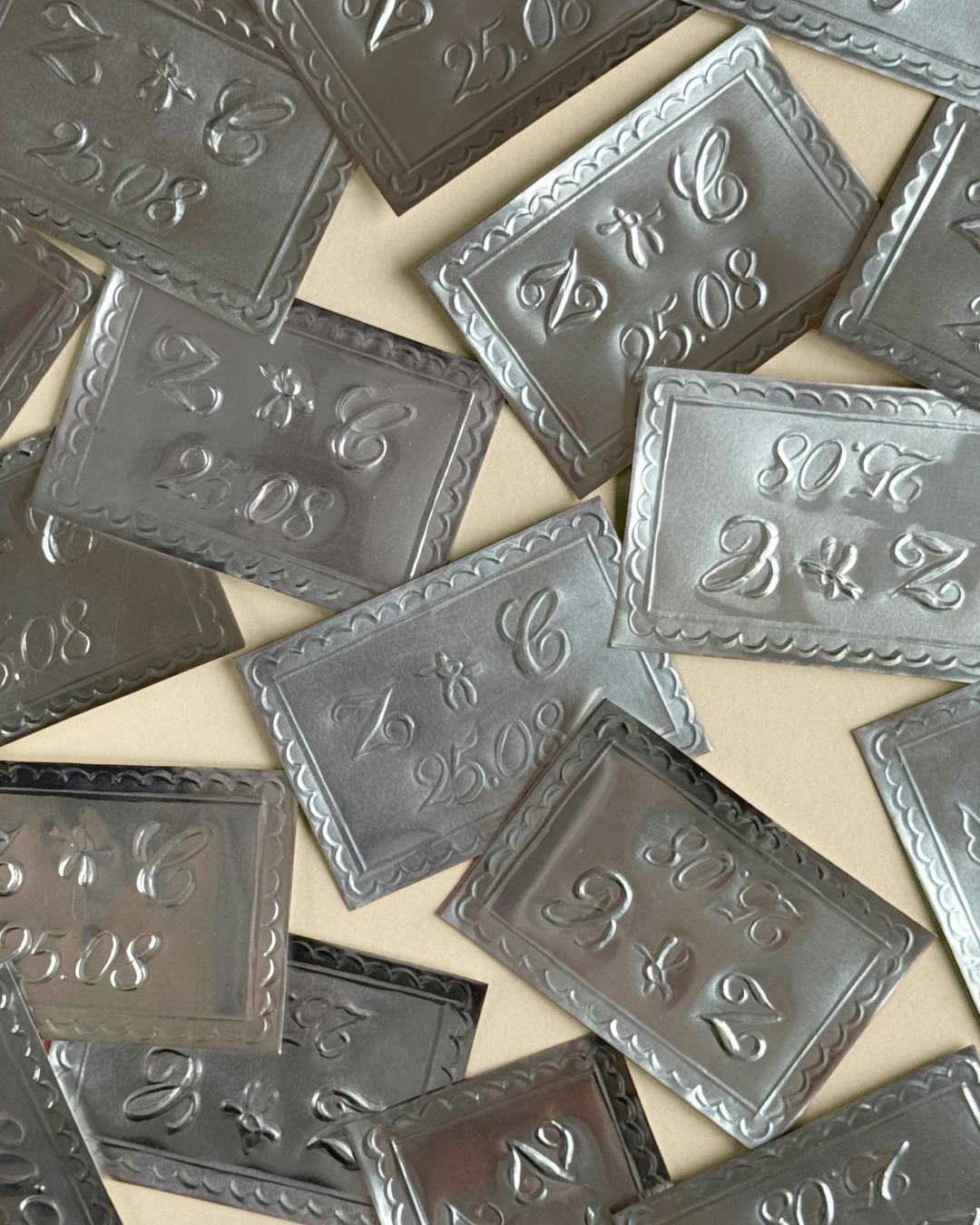 Hand-embossed foil wedding mementos