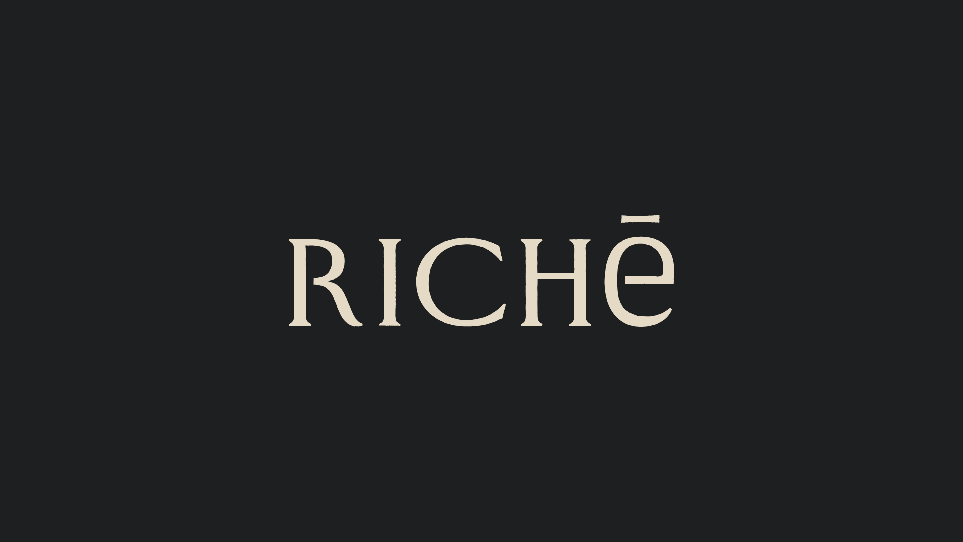 Minimal luxury Richē logo design displayed on a dark background with elegant serif typography and refined wellness brand aesthetics.