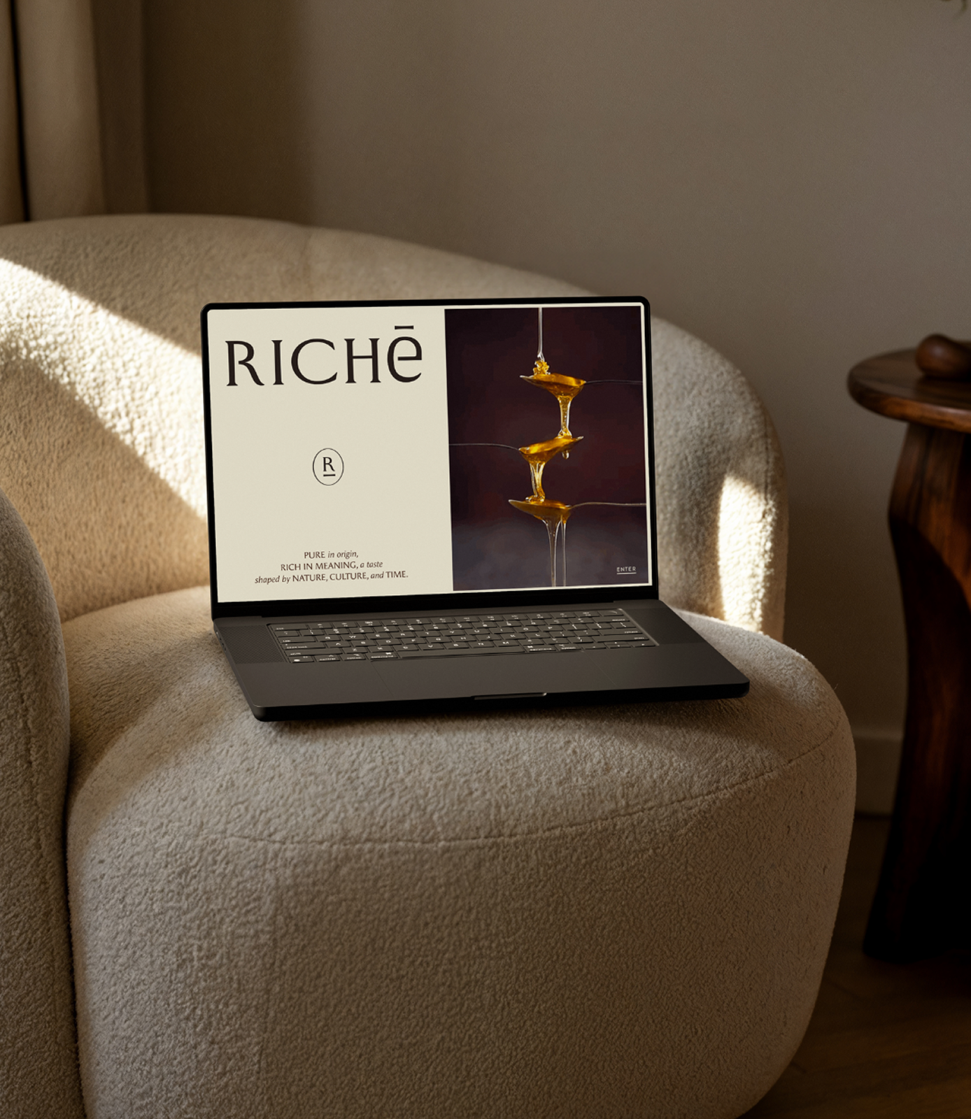 Luxury Richē wellness brand website mockup displayed on a laptop with minimalist editorial design, serif typography, and honey-inspired visual storytelling.