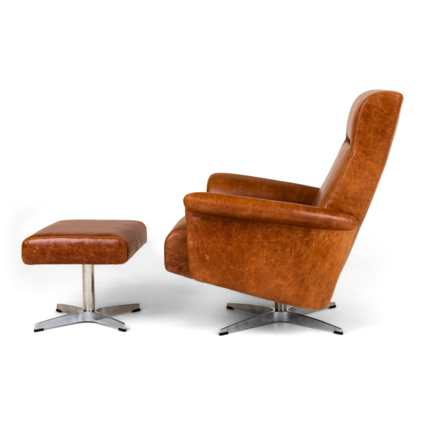 Side view of the Harlowe Chair paired with matching ottoman on a metal swivel base