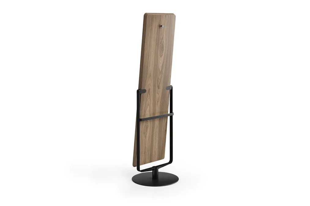 Back view of Continuum mirror highlighting natural walnut wood panel and black metal frame