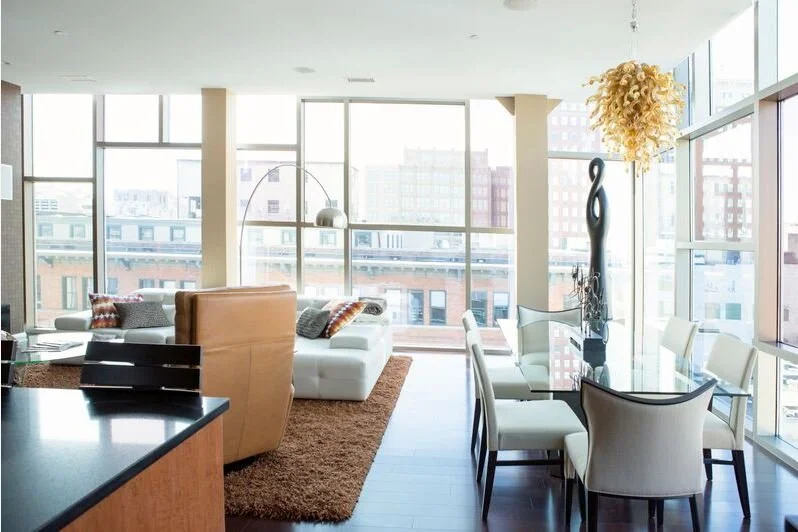 Downtown Indianapolis city scapes pair with contemporary furnishings to make this a show-stopping piece. 