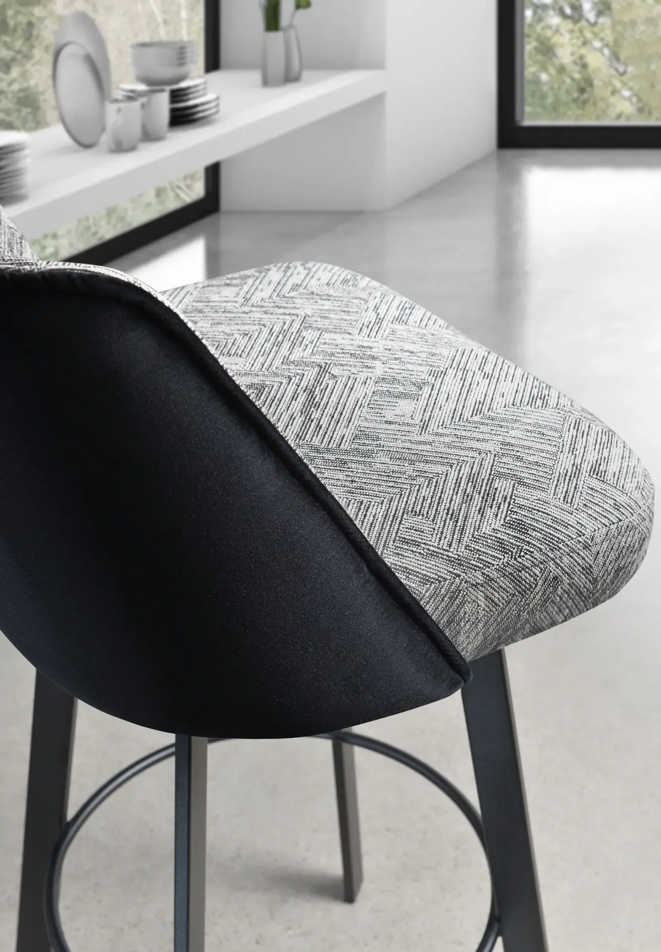 Close-up of Eva Stool seat showcasing textured upholstery detail