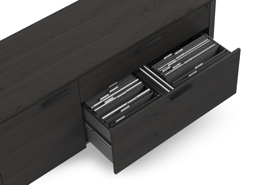 Close-up of charcoal Linea cabinet file drawers opened, showing organized black folders