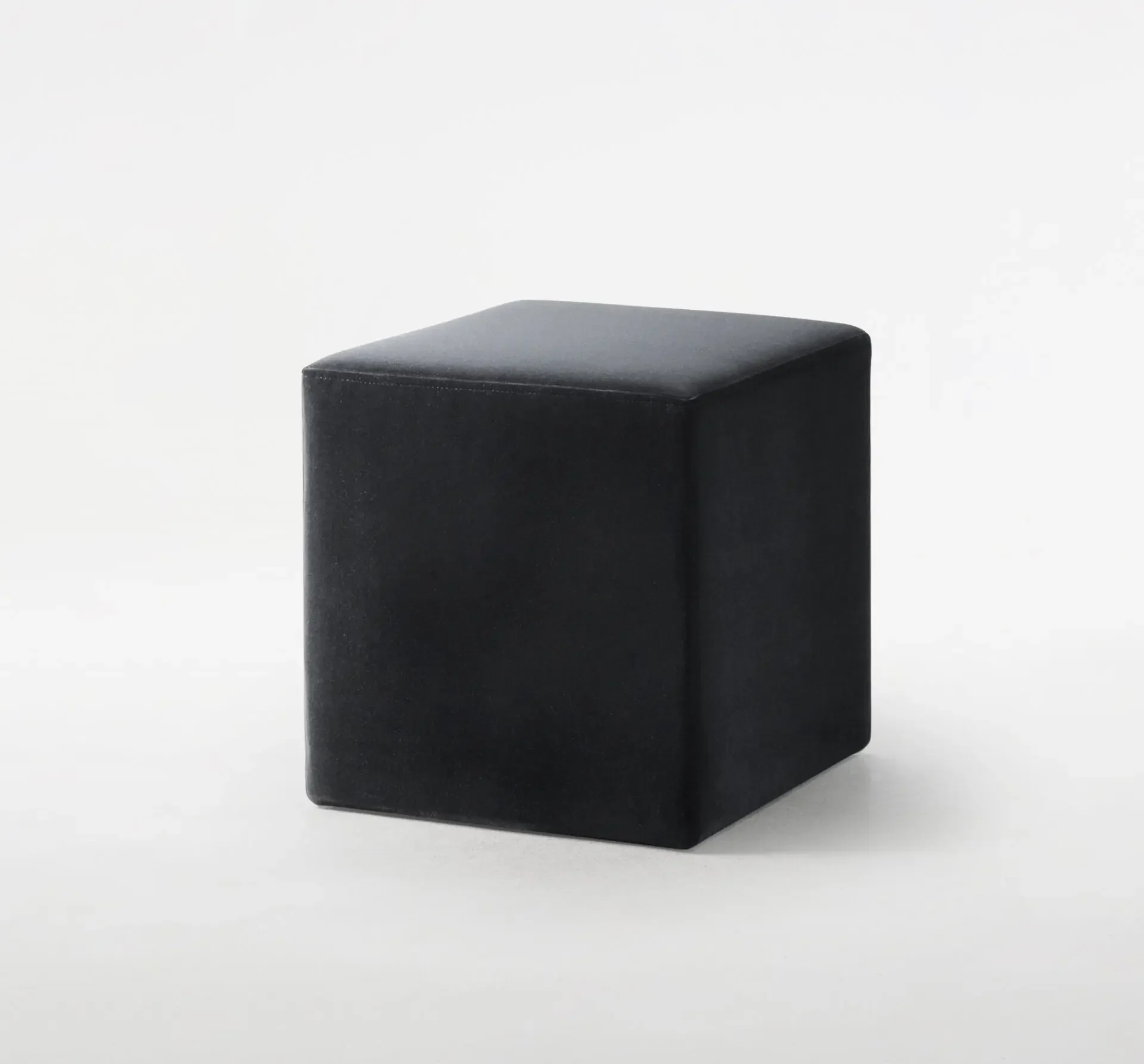 Black LePouf Ottoman cube in leather finish, front view