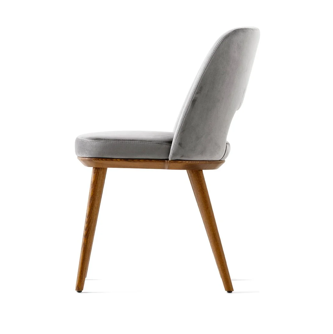 Side view of Calligaris Foyer Chair with light gray upholstery and wooden legs