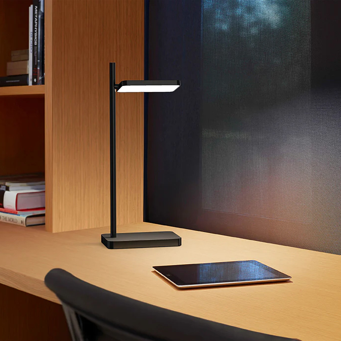 Talia Table Lamp on a desk providing LED task lighting