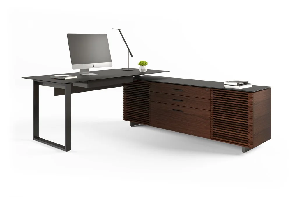 BDI Corridor L-Desk in chocolate walnut with desktop monitor, task lamp, and minimalist styling