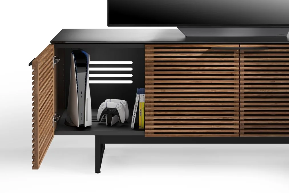 Interior view of Corridor Quad-Door Media Console storing gaming console and accessories