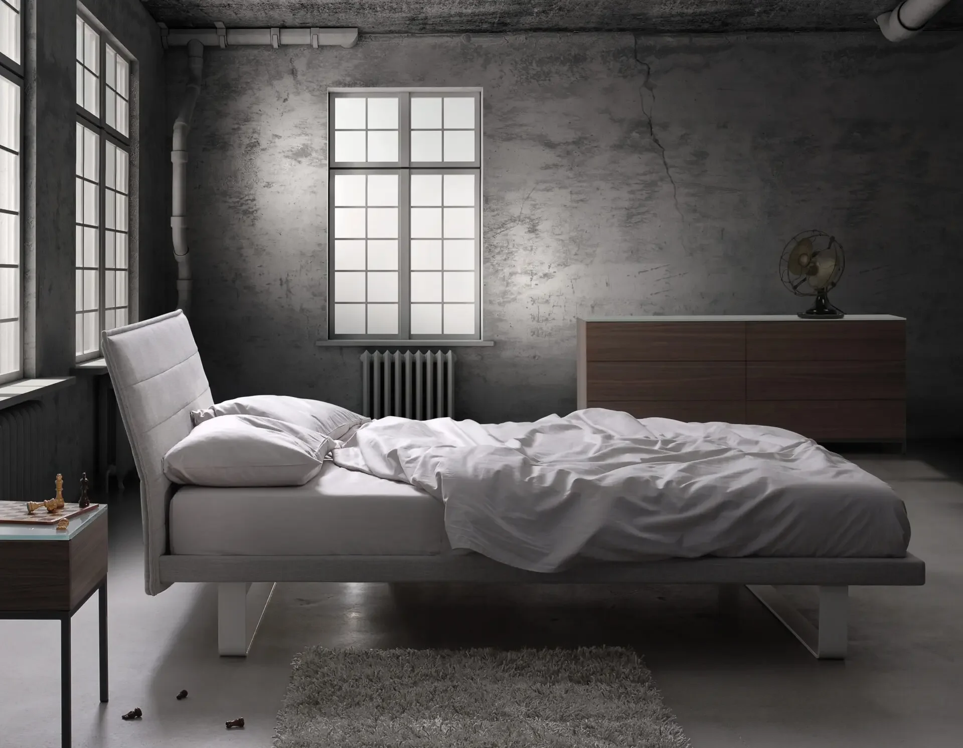 Industrial-style bedroom with Trica Envy Bed and grey upholstered headboard