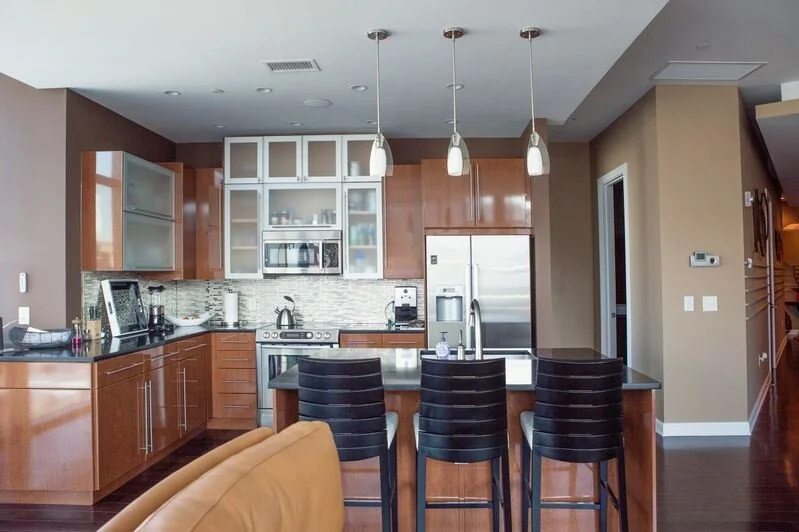 Downtown Indianapolis city scapes pair with contemporary furnishings to make this a show-stopping piece. 