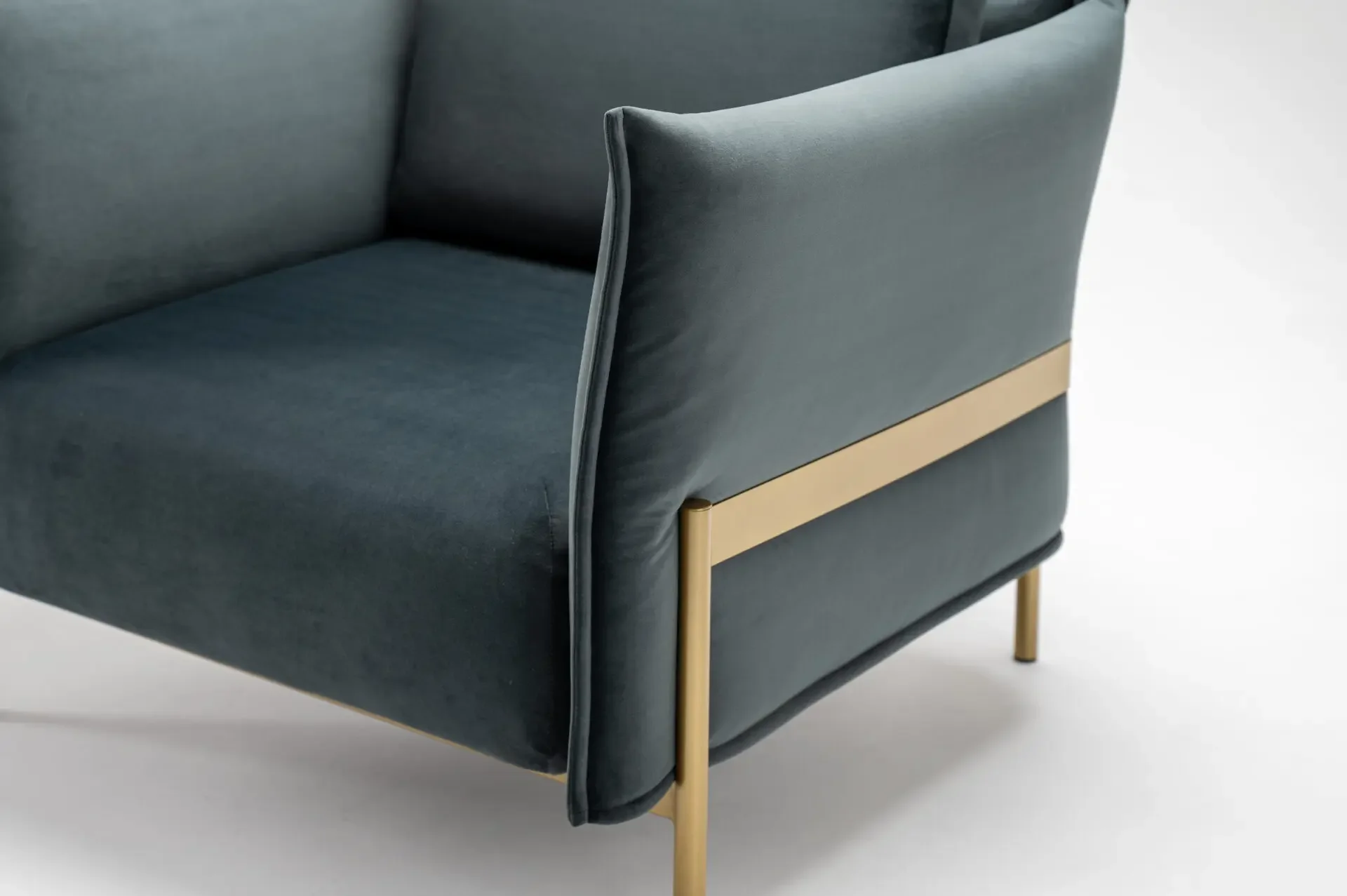 Close-up of brass frame detail on Trica Le Beaumont Chair backrest