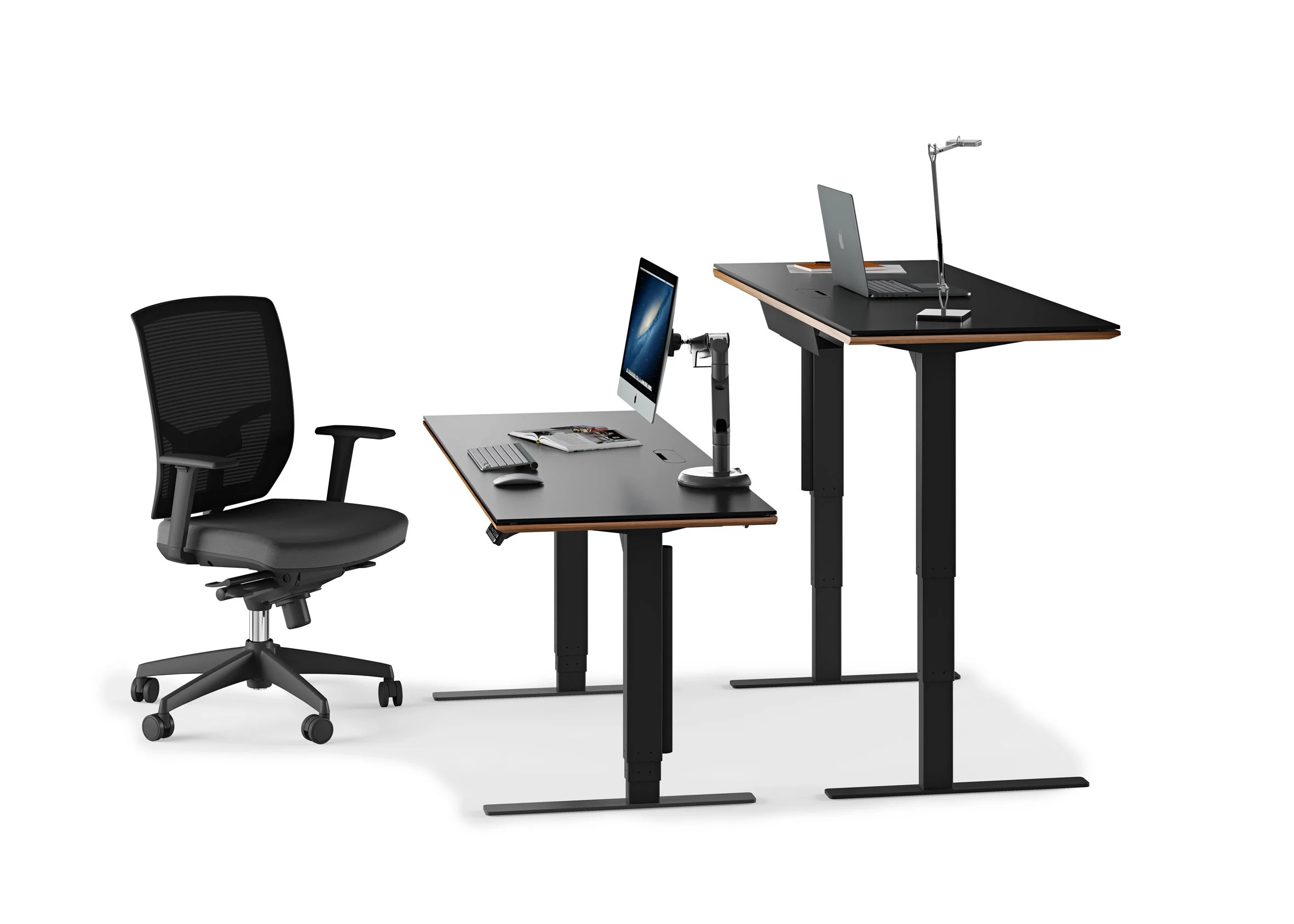 Sequel Lift Standing Desk in seated position with task chair and monitor setup