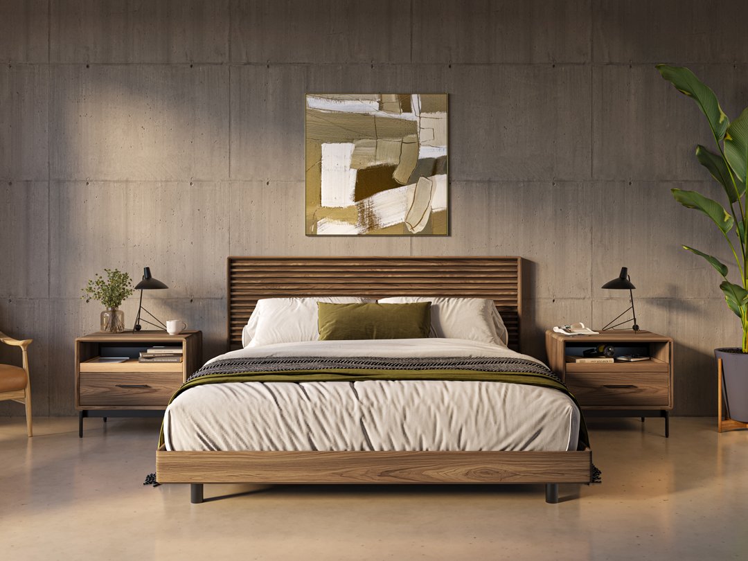 Cross-LINQ bed styled with artwork and walnut nightstands in a warm modern bedroom
