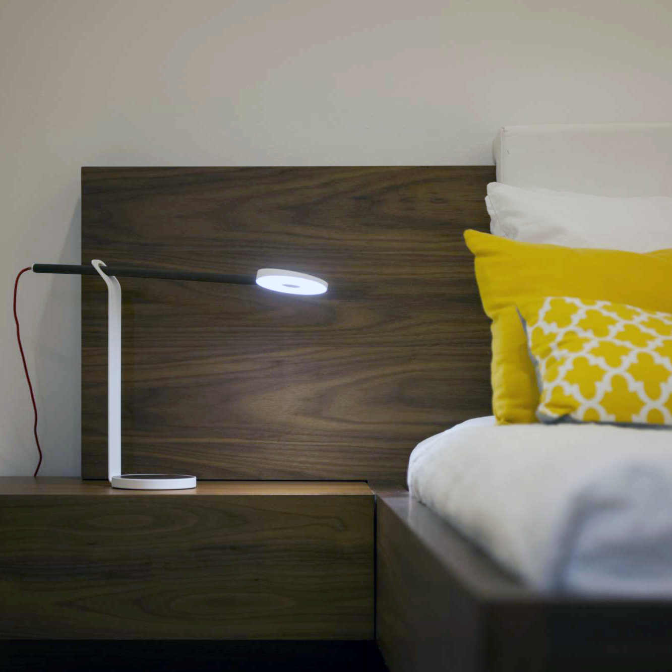 Koncept Gravy Desk Lamp on bedside table next to bed