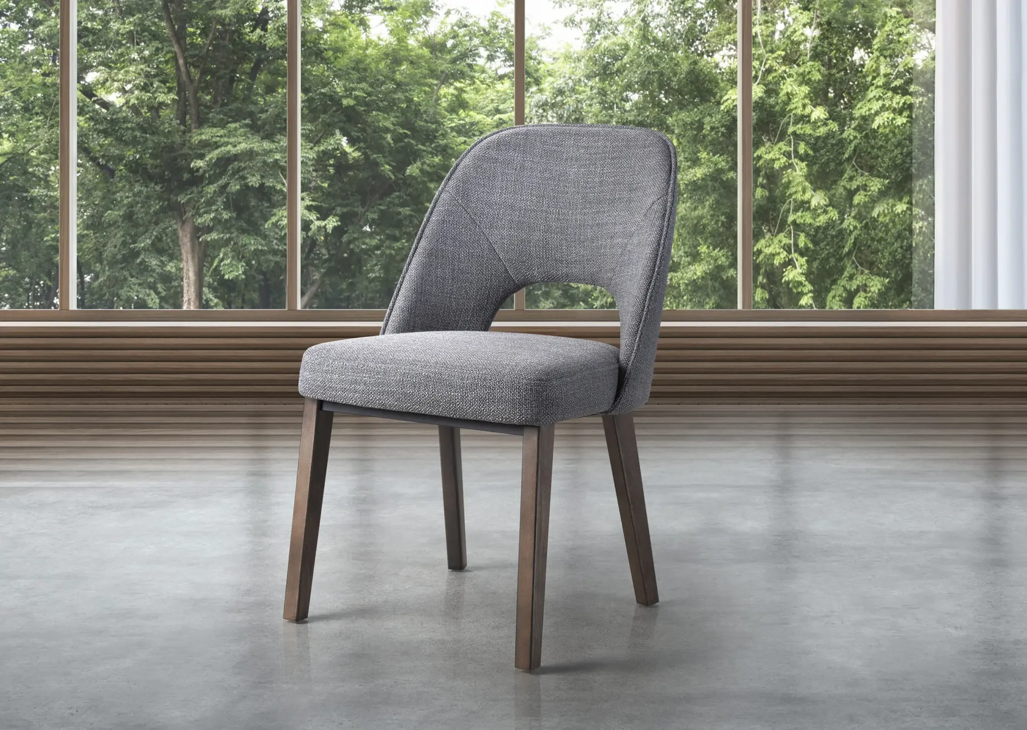 Trica Mia Dining Chair in grey fabric placed by large window in modern dining space