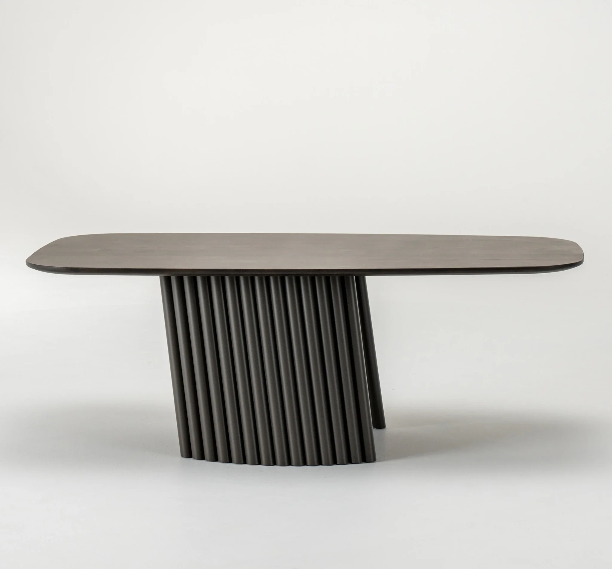 Front view of Trica Pisa Cocktail Table with sculptural fluted base and wood top
