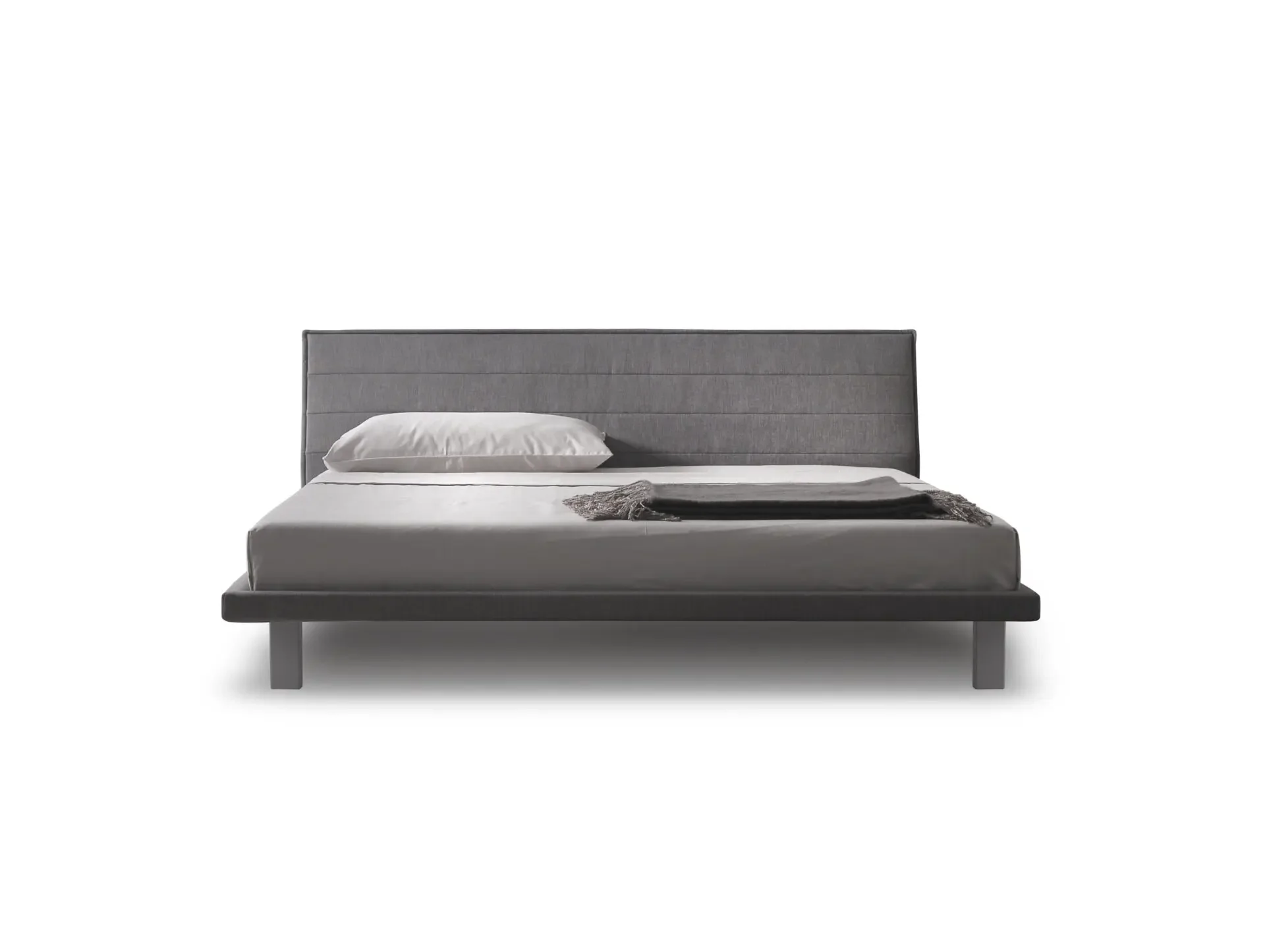 Front view of Trica Envy Bed in grey upholstery with modern low platform design
