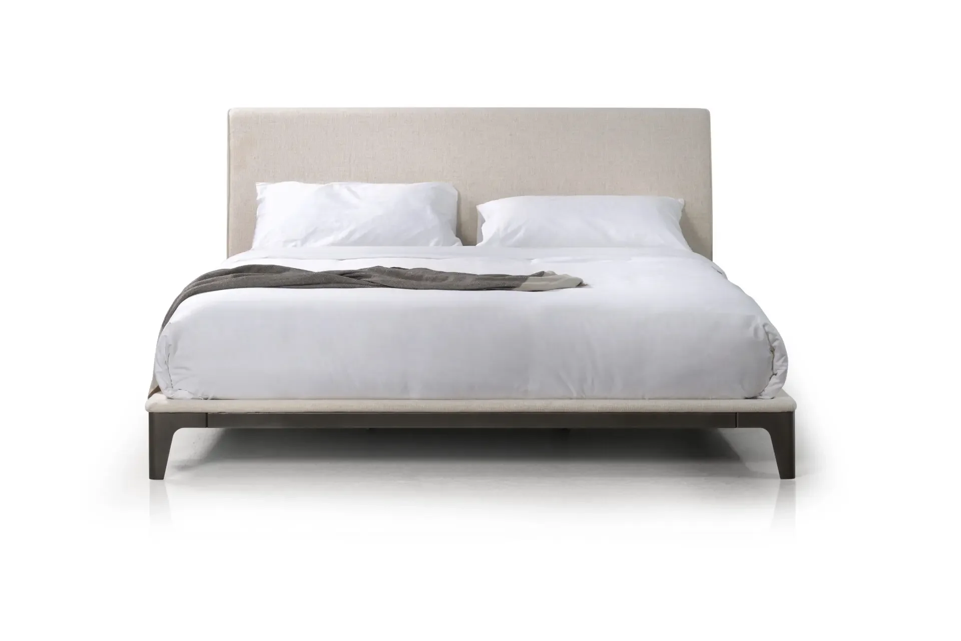 Front view of Trica Nuance Bed with upholstered headboard and low-profile frame