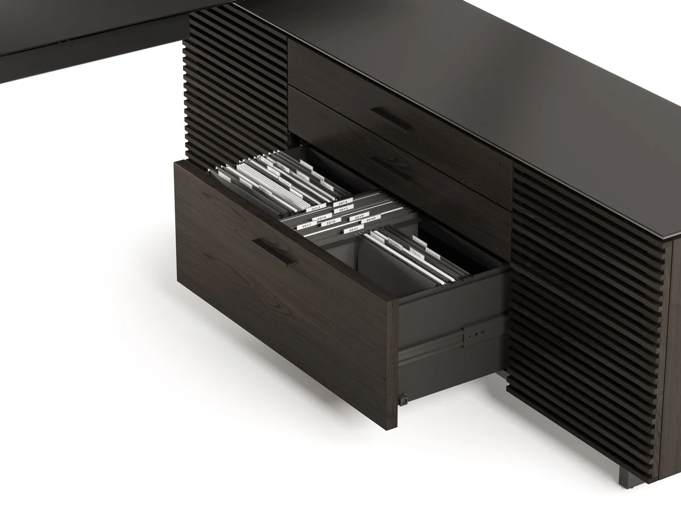 Open drawer of Corridor L-Desk in charcoal finish showing organized filing system