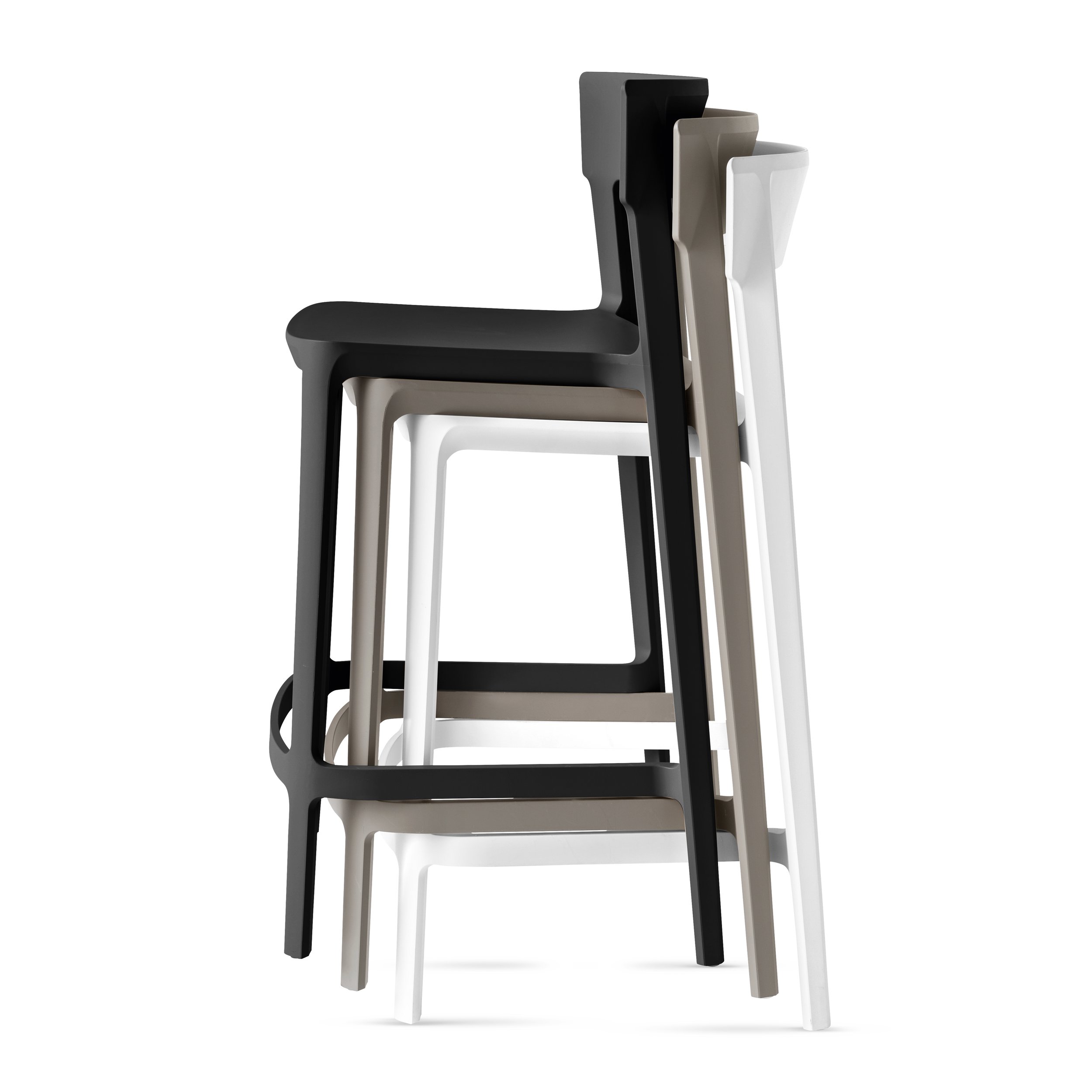 Stacked Calligaris Skin Stools in black, taupe, and white