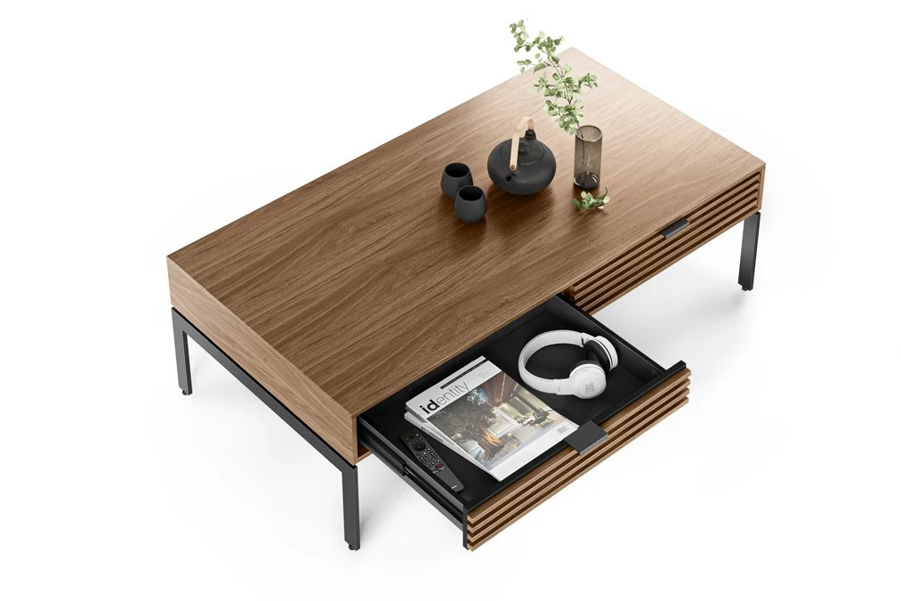 Top-down view of Cora Coffee Table showing open drawer with storage items