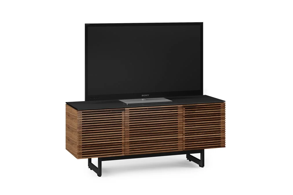 Corridor Triple-Door Media Console with flat-screen TV on top and media components inside