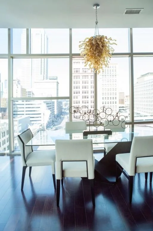 Downtown Indianapolis city scapes pair with contemporary furnishings to make this a show-stopping piece. 