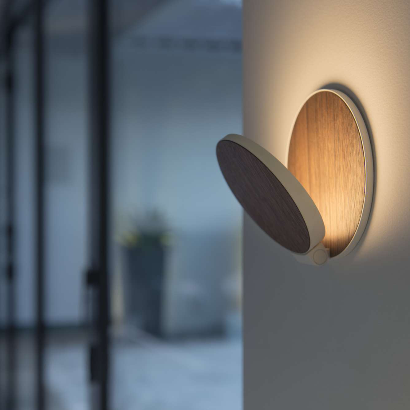 Koncept Gravy Wall Sconce illuminating hallway wall