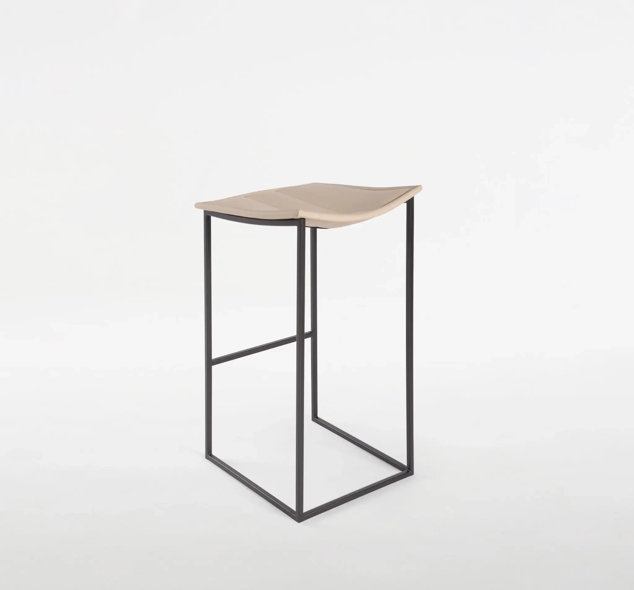 Trica Bocca Counter Stool with beige upholstered seat and black metal frame, side profile