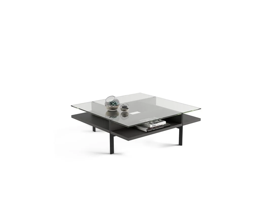 Terrace Square Coffee Table with glass top, black base, and decorative accessories