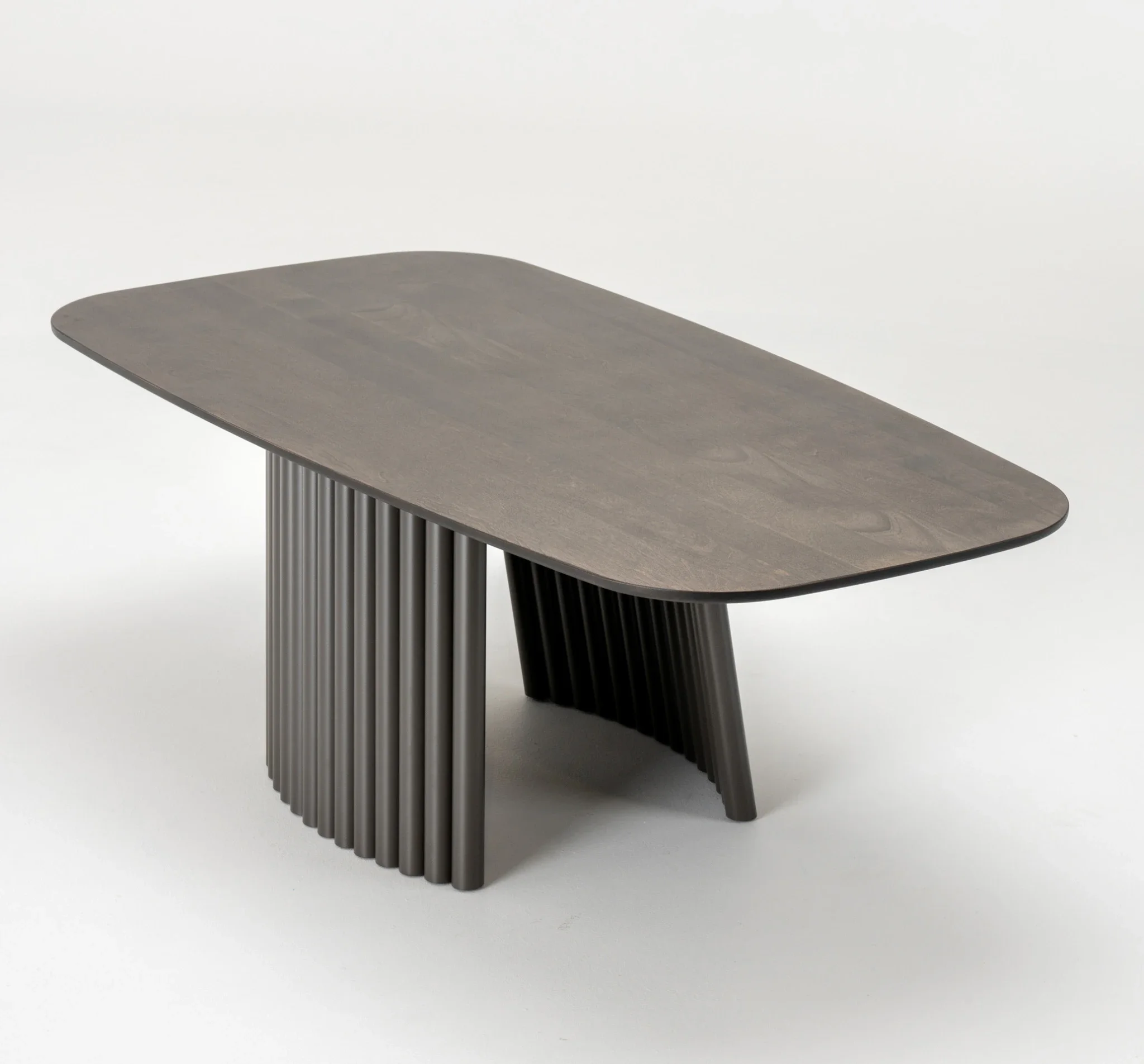Quarter view of Pisa Cocktail Table with sleek rounded wood top