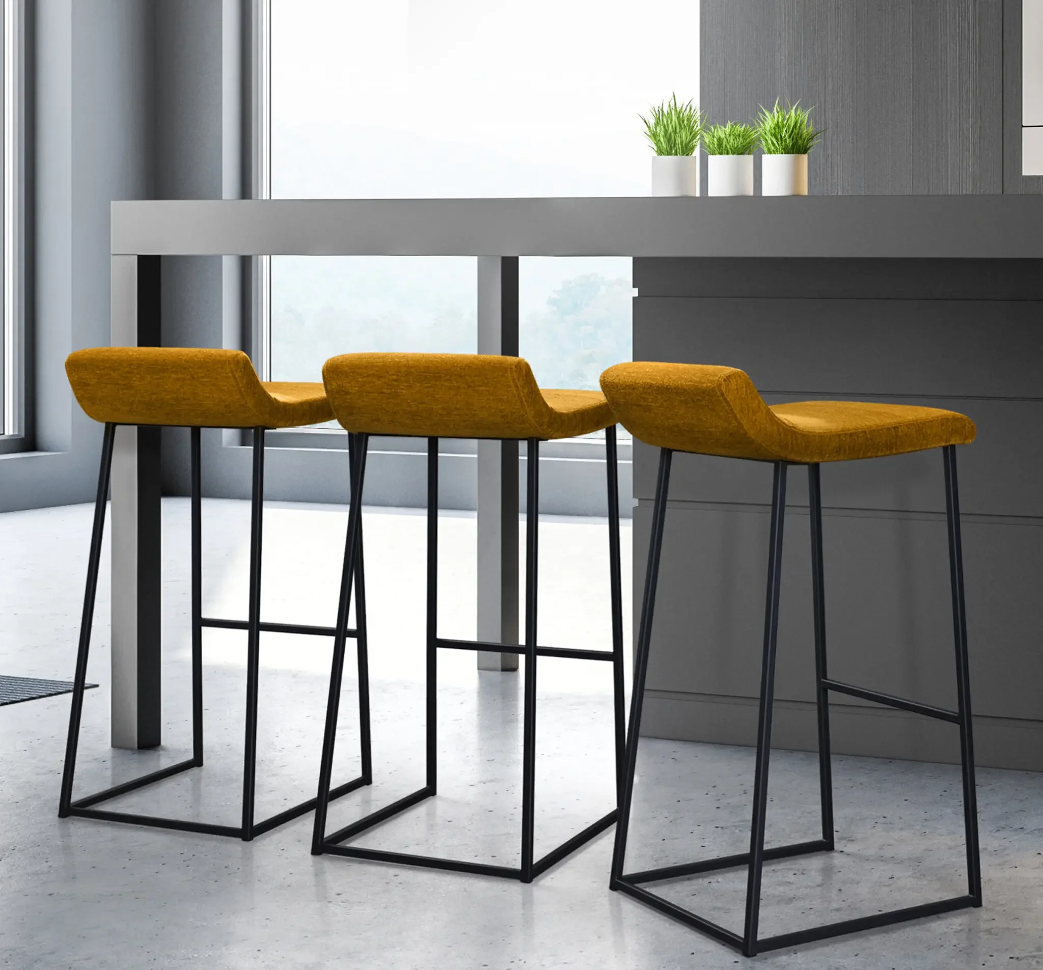 Set of yellow Zoey Stools at a modern kitchen counter