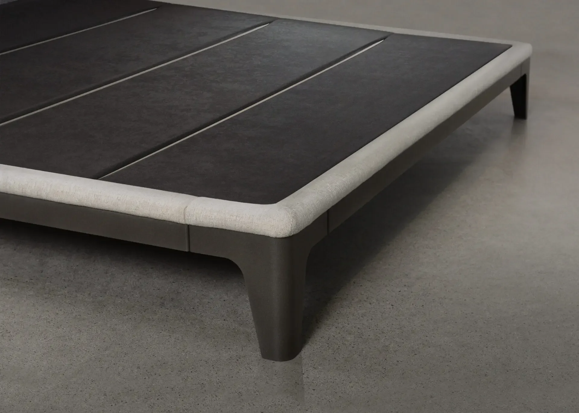 Close-up of Nuance Bed platform base with leather detailing