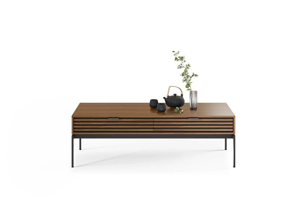 Front view of Cora Coffee Table styled with minimalist vases on top