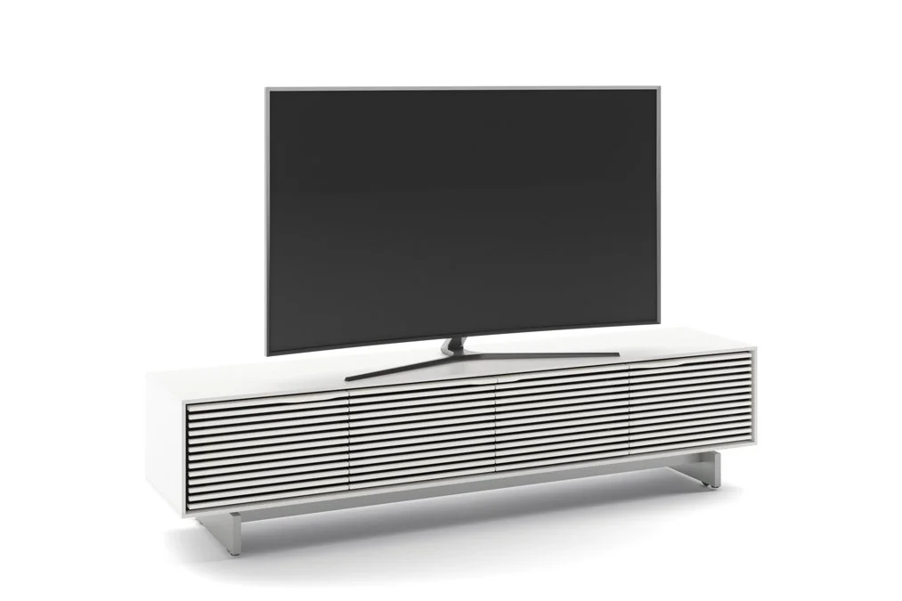 Align Low Quad Cabinet used as a TV stand with flat-screen television mounted above