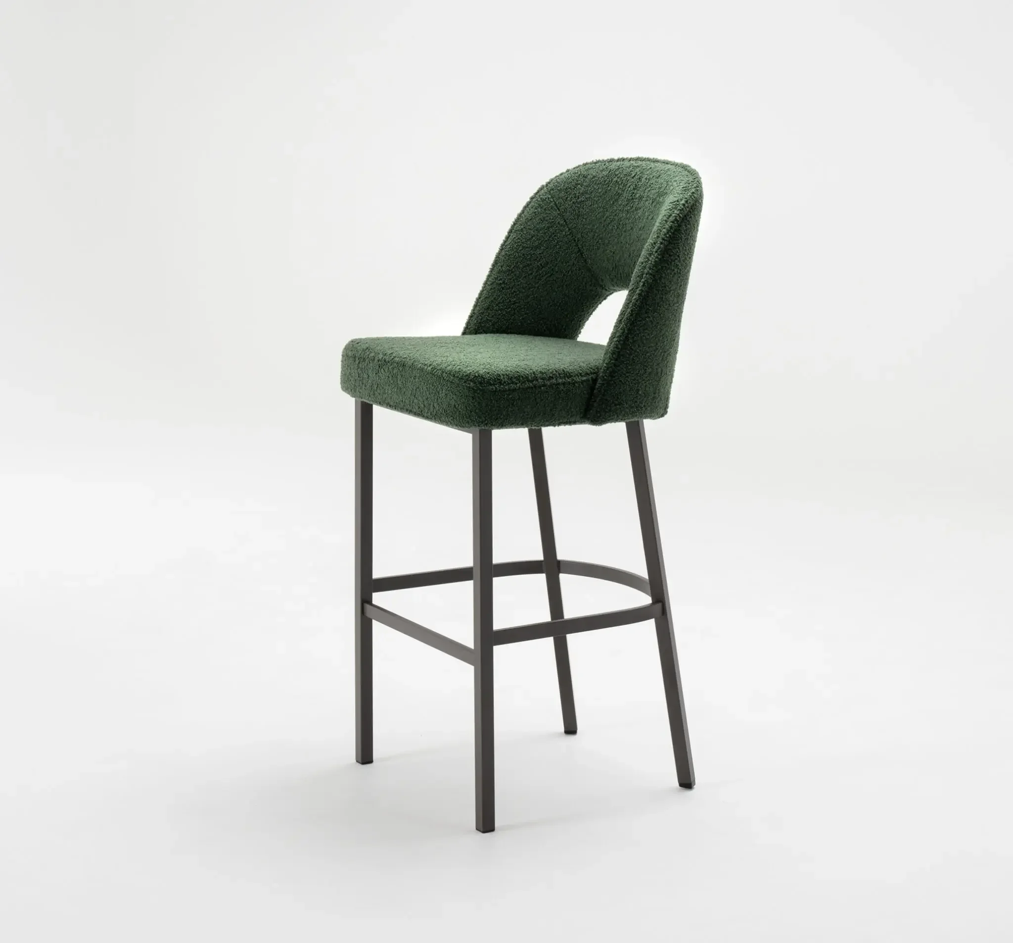 Front angled view of the Mia Barstool showcasing plush green upholstery and slim metal legs.