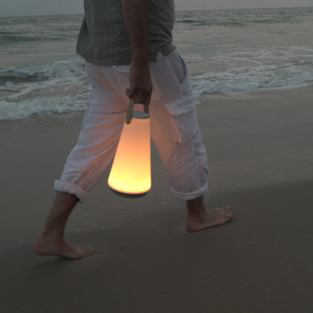 Uma Lantern glowing on the beach at night