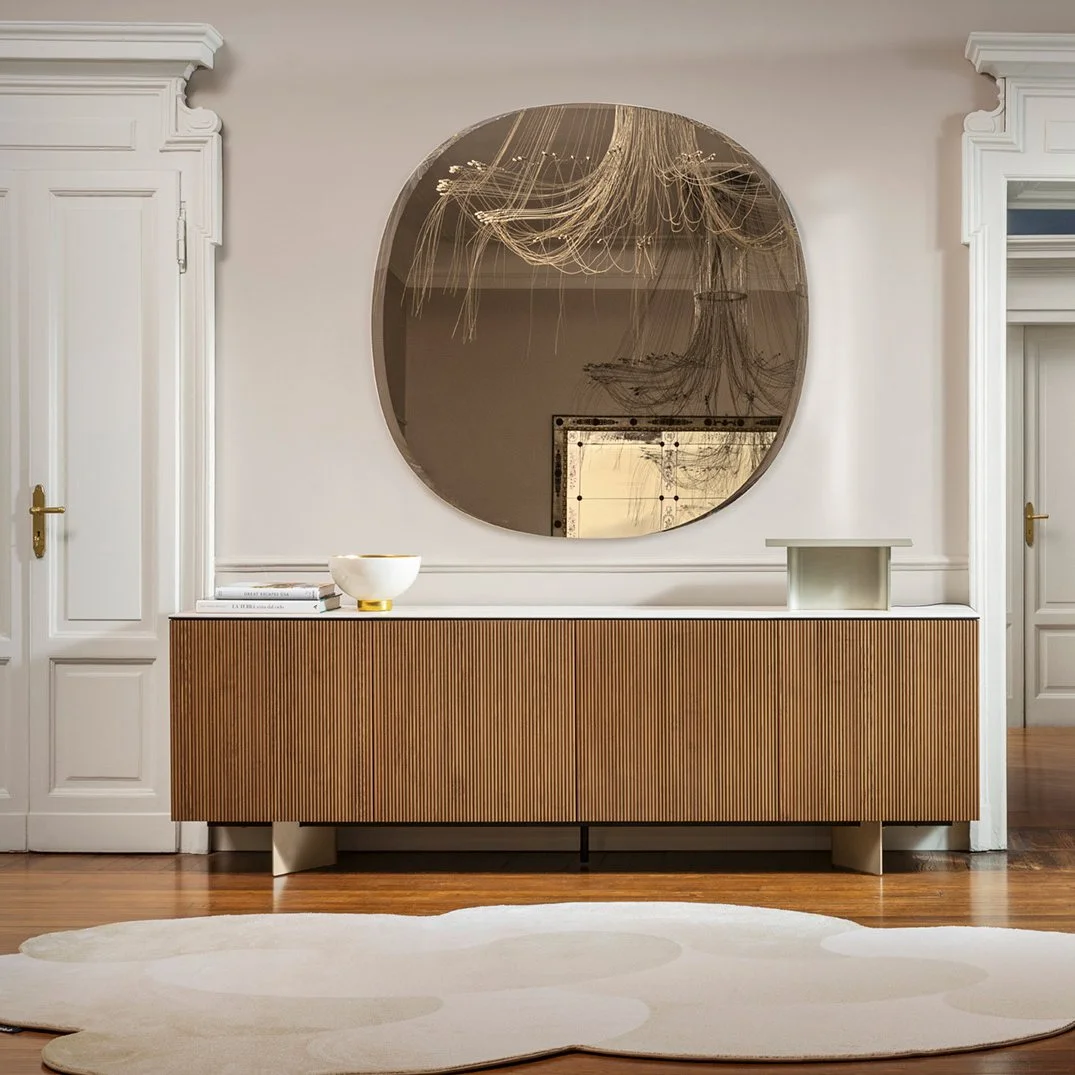 Universal Buffet in a modern dining room with round mirror above