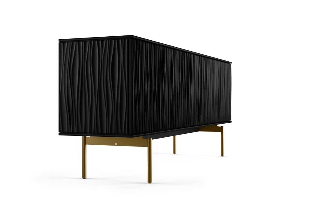 Side profile of the Tanami Credenza emphasizing its wave-like sculpted detail and slim legs