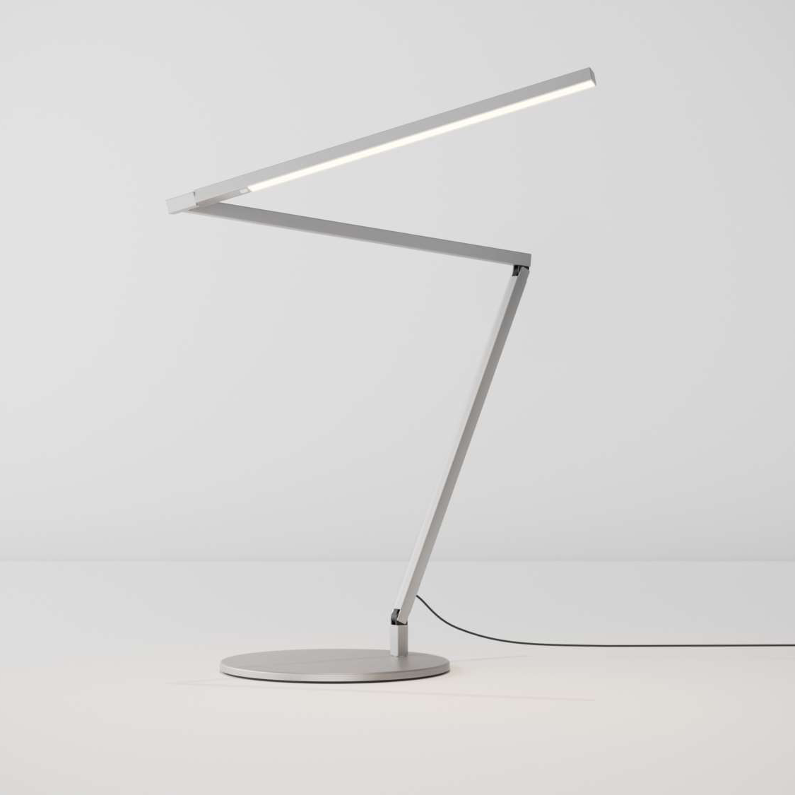Koncept Z-Bar Floor Lamp with adjustable arm on round base