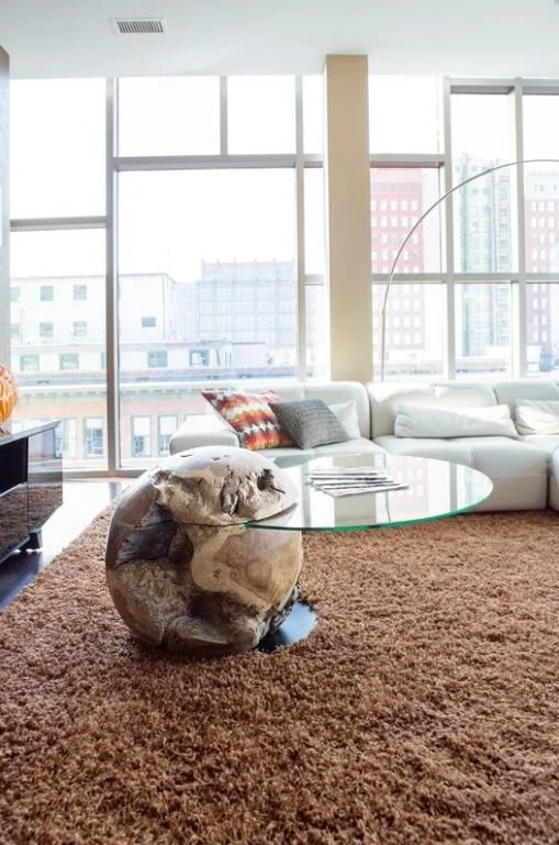 Downtown Indianapolis city scapes pair with contemporary furnishings to make this a show-stopping piece. 