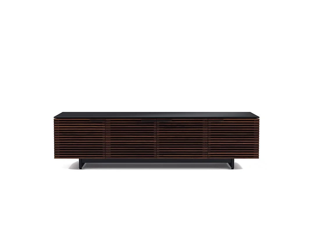 Front view of the Corridor Low Quad-Door Media Console in a wood finish with louvered doors