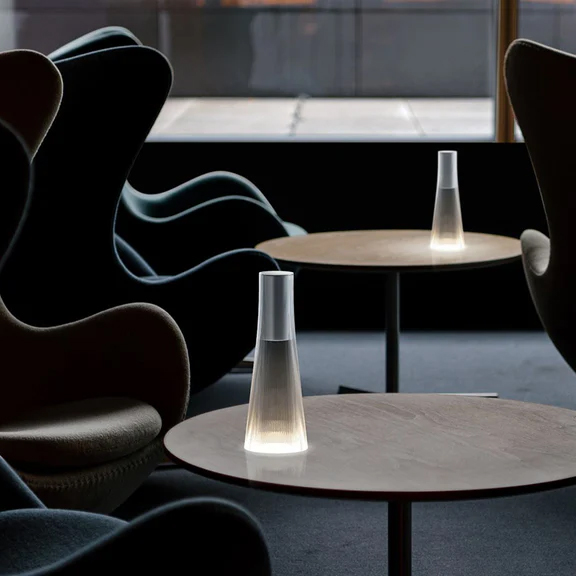 Pablo Candel Table Lamps creating ambiance in a contemporary lounge setting