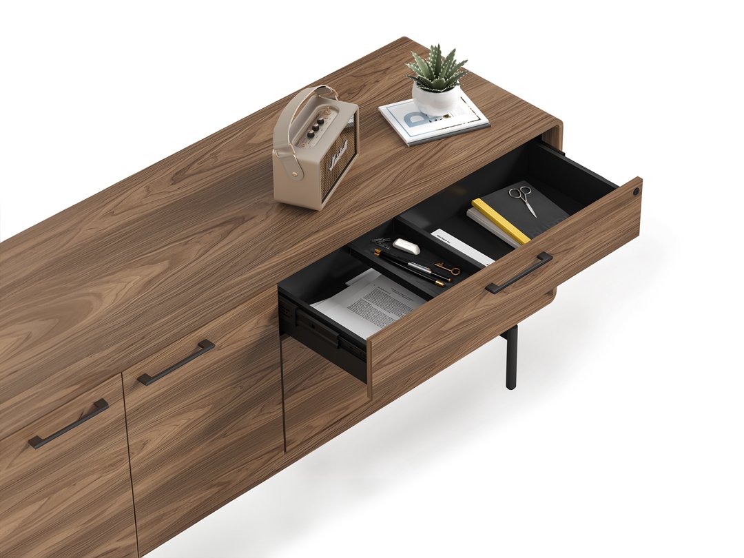Top-down view of LINQ credenza with drawer open showing organized contents