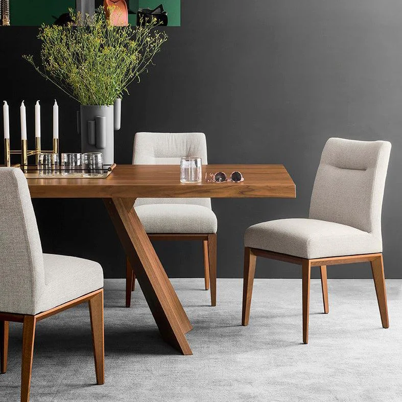 Modern dining room with Calligaris Tosca Chairs around a wooden dining table