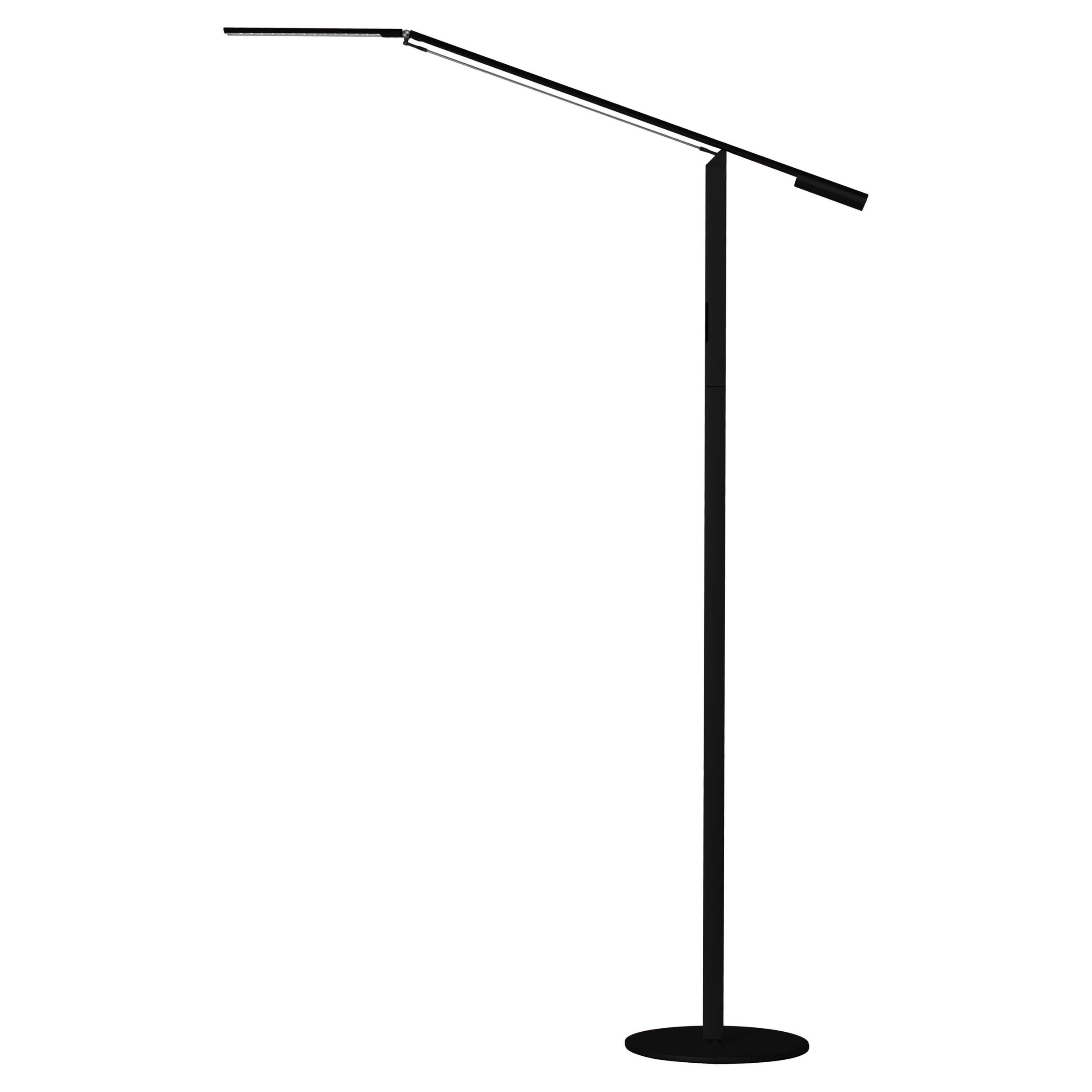 Equo Floor Lamp in black finish with LED head angled forward