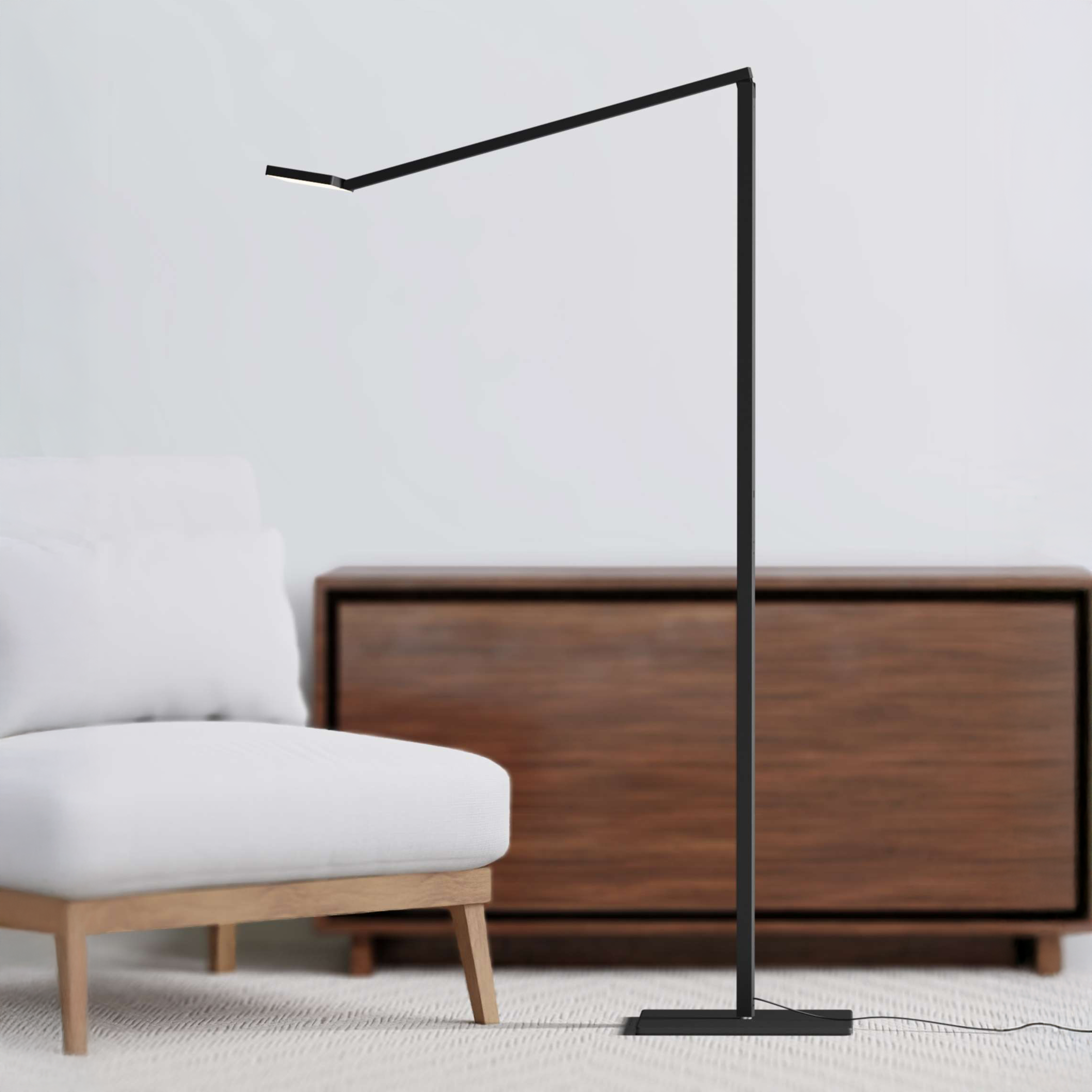 Koncept Focaccia Floor Lamp in black finish styled in a modern living room