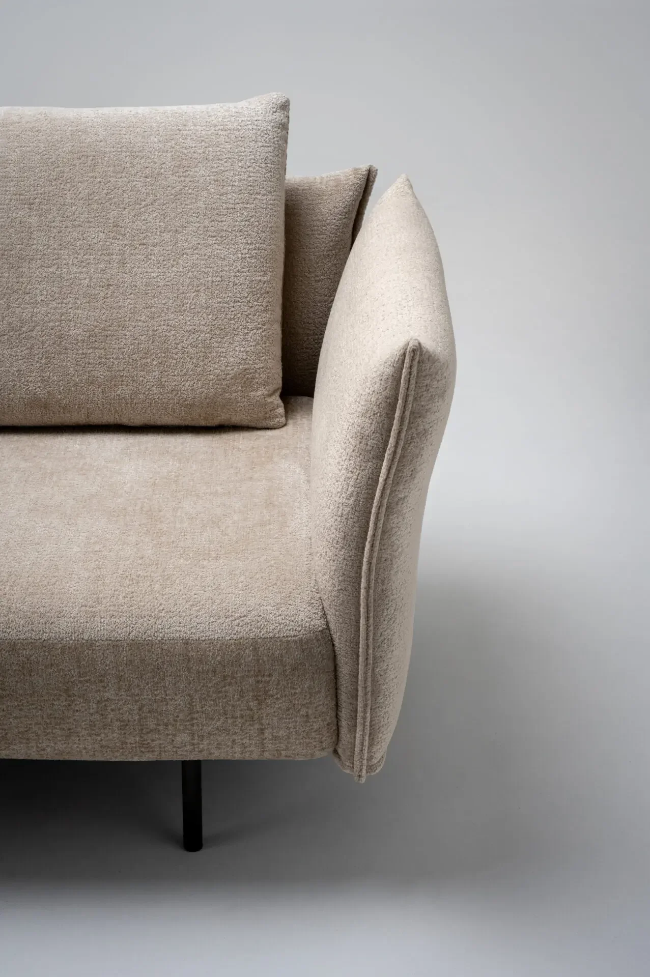 Front angled view of Trica Le Beaumont Sofa with plush cushions and curved arms